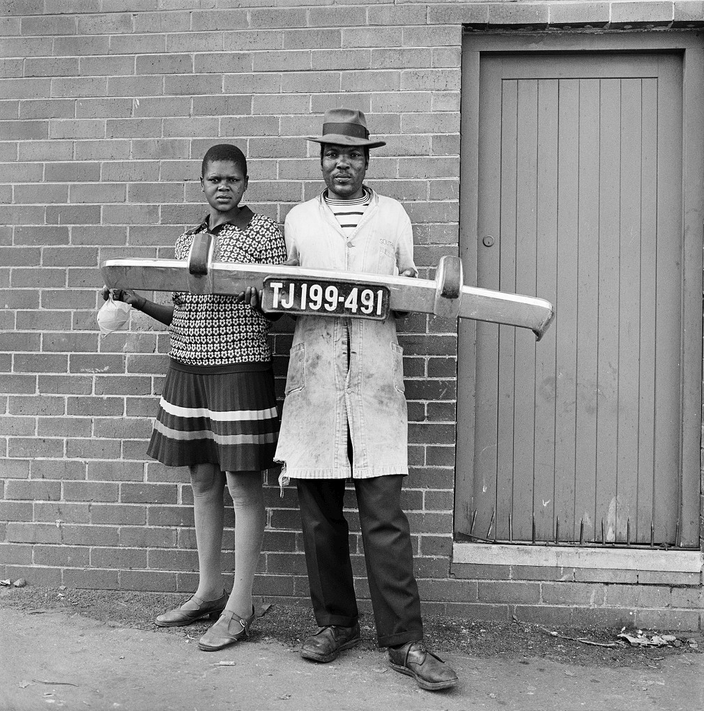 She said to him &#39;You be the driver and I&#39;ll be the madam,&#39; then they picked up the fender and posed, Hillbrow. 1975

Silver gelatin print on fibre-based paper

39.9 x 39.9 / 15.7 x 15.7 in.

Edition of 8